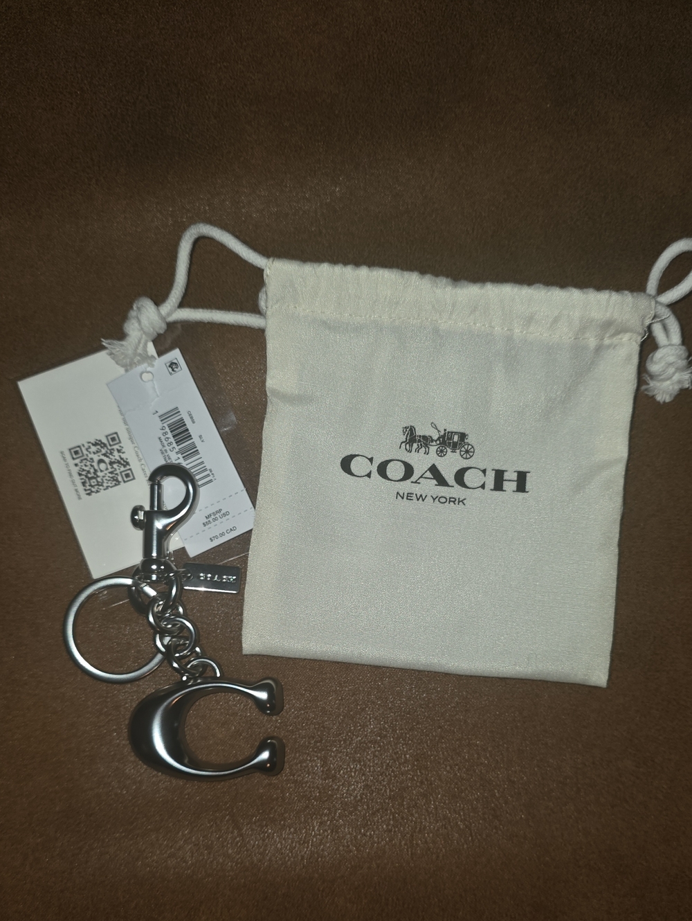 Coach Silver Metal 'C' Keychain with Cream Drawstring Pouch